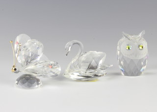 A Swarovski Crystal figure of an owl 5cm, a ditto swan 4.5cm and a butterfly 6cm 