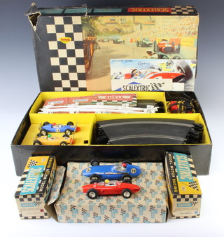 2 Scalextric slot racing cars C/55 Vanwall and C/62 Ferrari boxed together with a Scalextric set 50 boxed containing 2 cars, some damage to the side of the box 