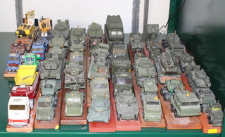 A collection of  model tank transporters, tanks and plant transporters