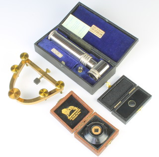 Swift and Sons, a 19th Century brass Freezing Microtome (1883-1885) top section only "The Ultra Lens" boxed, a microscope slide boxed and 1 other item boxed 