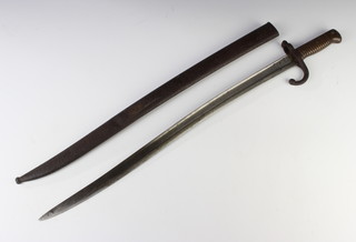 A 19th Century French chassepot bayonet, the blade marked St Etienne 1872 complete with scabbard (corroded) 