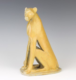 A ceramic studio figure of a seated big cat 24cm 