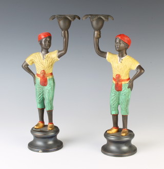 A pair of 18th Century style bronze candlesticks in the form of standing liveried servants 28cm x 7cm diam