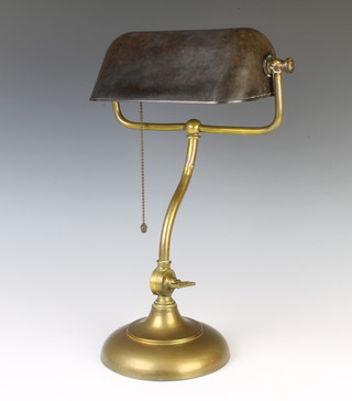 A brass bank light raised on a circular base with Bakelite shade 38cm x 28cm x 12cm 