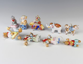 A 20th Century Russian ceramic Christmas tree decoration in the form of an elephant 4cm and 8 others

