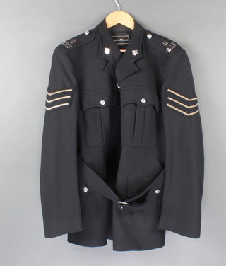 A Sussex Constabulary Police Sargent's tunic by Huggins of Bristol, collar no. B223, some moth to the lapel, sleeves and back 