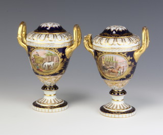A pair of 19th Century Austrian twin handled vases and covers, the gilt and blue ground decorated with farming scenes and flowers with waisted stems 15cm 