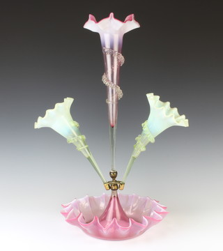 A Victorian vaseline glass epergne with centre pink tapered flute flanked by 2 green tapered flutes raised on a pink base 35cm 
