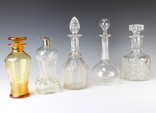 A cut glass mallet decanter and stopper 26cm, 2 others, a silver topped ditto and an Art Deco amber glass decanter and stopper