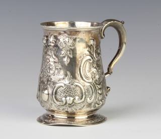 A George III repousse silver mug with flowers and scrolls, London 1775 maker William Cripps  190 grams, 9cm 