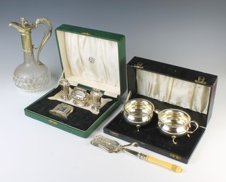 A Victorian silver plated mounted ewer, a cased jug and bowl and 4 plated cigarette lighters 