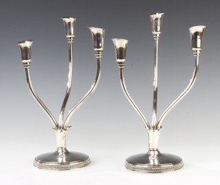 A pair of Peruvian silver 3 branch candelabra 854 grams, 23cm 