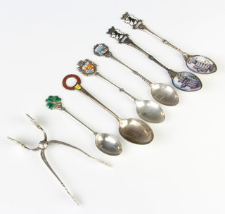 Six Continental silver and enamelled teaspoons and a pair of silver nips 93 grams