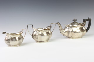 An Edwardian silver 3 piece tea set with ebony mounts, Birmingham 1906, maker William Aitkin gross 532 grams