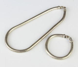 A Continental silver smooth link necklace and bracelet 153 grams