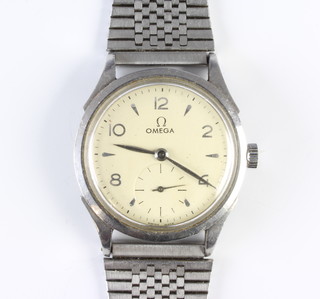 A gentleman's steel cased Omega wristwatch with seconds at 6 o'clock on a later bracelet