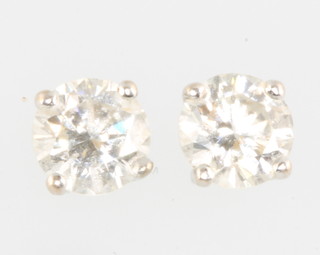 A pair of 18ct white gold brilliant cut single stone diamond ear studs, each approx. .40ct 