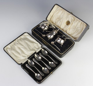 A set of 6 cased silver teaspoons Birmingham 1928 and a 3 piece silver condiment 190 grams 