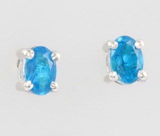 A pair or neon appatite earrings