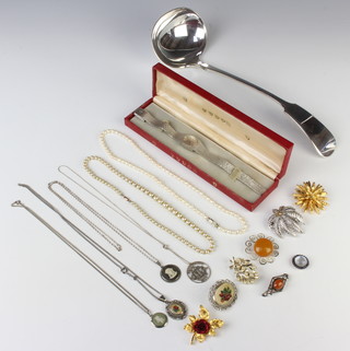 A silver plated ladle and minor jewellery including a plated wristwatch 