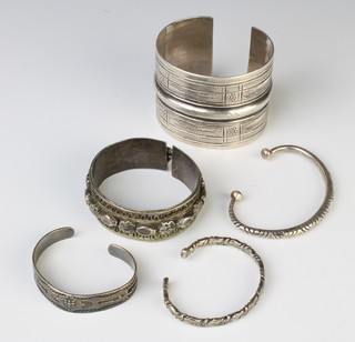 A silver bangle and 4 others, 295 grams