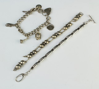 A silver charm bracelet and 2 other bracelets, 80 grams