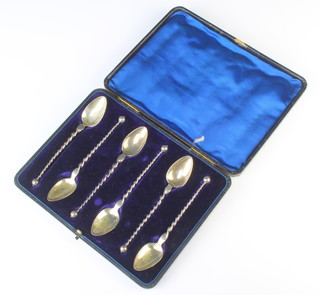 A set of 6 Continental silver spoons with twist stems, 44gms