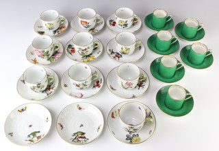 A Herend part coffee set comprising 10 cups and 12 saucers decorated with insects and flowers together with a Thomas Goode and Co. coffee set comprising 6 coffee cups and 6 saucers together with 2 ochre and gilt saucers