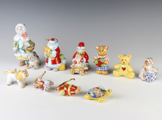 A 20th Century Russian ceramic Christmas tree decoration in the form of Santa Claus and 9 others