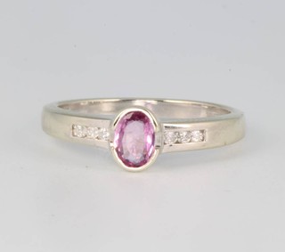 A 9ct yellow gold pink sapphire and diamond ring size N 