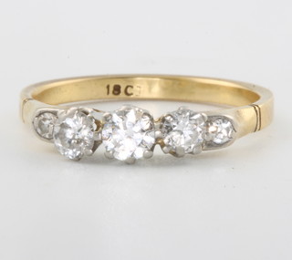 An 18ct yellow gold 5 stone diamond ring size O 1/2