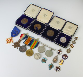 A First World War medal trio to 997 GNR.F.E. Tyrell R.F.A, 4 cased sports medals and minor medallions etc 