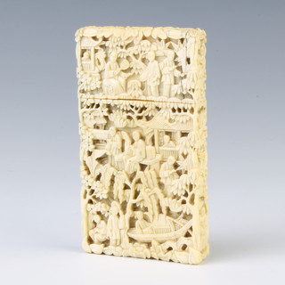 A 19th Century Cantonese carved ivory card case depicting figures before pavilions 9cm x 5cm x 1cm 