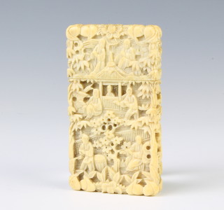 A 19th Century Cantonese carved ivory card case depicting figures before pavilions 8cm x 4.5cm x 1cm 