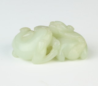 A Chinese Celadon jade carving of 2 lion cubs 5.5cm
