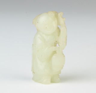 A carved jade figure of a standing gentleman 5cm 