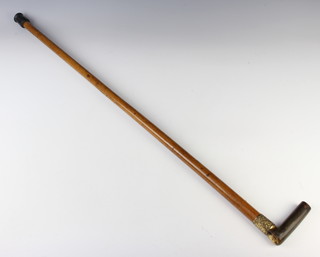 A Victorian gilt mounted cane with horn handle
