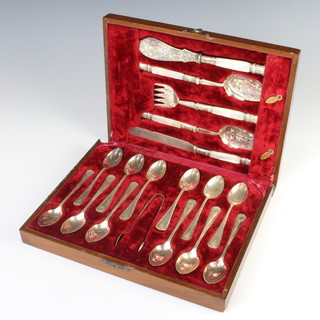 A cased set of 12 Edwardian silver plated tea spoons and nips together with 2 knives, a fork and 2 spoons 