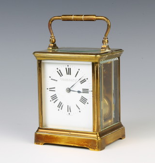 An 8 day striking carriage clock with enamelled dial and Roman numerals contained in a gilt case, the dial marked William Burford and Sons Exeter and Eastbourne 