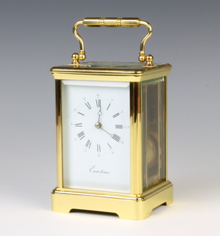 A 20th Century carriage timepiece with enamelled dial and Roman numerals marked Eurotime, the back plate marked Made in France 11, 11 jewels Unadj 