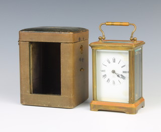 Japy Freres, a French carriage timepiece with enamelled dial and Roman numerals, contained in a gilt metal case 
