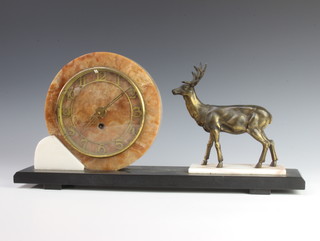 An Art Deco French 8 day timepiece contained in a 3 colour marble case with gilt chapter ring and Arabic numerals supported by a figure of a standing stag 