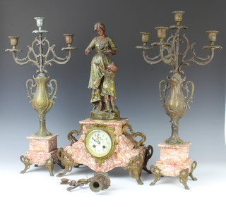 A 19th Century Art Nouveau French 3 piece spelter and marble clock garniture comprising striking mantel clock with porcelain dial and Arabic numerals contained in a pink marble  case surmounted by a spelter figure of a mother and child together with a pair of matching 3 light candelabrum 