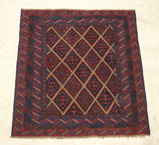 A black and red ground Gazak rug with diamond field 120cm x 106cm 