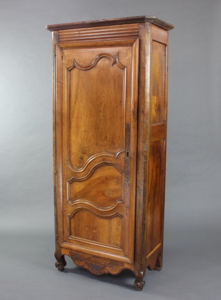 An 18th Century fruitwood cabinet with moulded cornice, fitted shelves enclosed by panelled doors 179cm h x 81cm w x 45cm d 