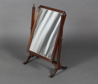 A Georgian mahogany dressing table mirror contained in a swing frame 64cm x 39cm x 24cm 