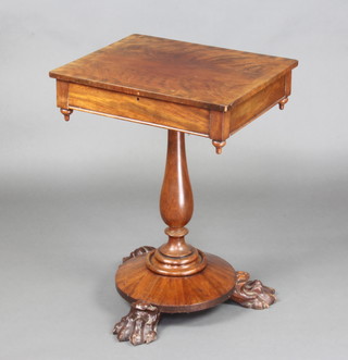 A Victorian rectangular mahogany occasional table with crossbanded top raised on a baluster turned column with circular base and paw feet 70cm x 51cm x 43cm 