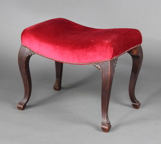 A Georgian style rectangular mahogany dressing table stool with saddle shaped seat raised on carved cabriole supports 47cm h x 53cm w x 40cm d 
