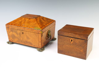 A Georgian crossbanded mahogany sarcophagus shaped trinket box with ring drop handles, the interior fitted a tray 15cm h x 22cm w x 17cm d, together with a Victorian rosewood twin compartment tea caddy with hinged lid 11cm x 14cm x 11cm 