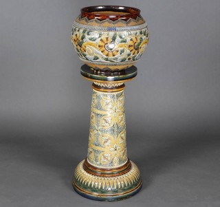 A Doulton Lambeth bulbous jardiniere decorated with a wide band of scrolling flowers with stand, with cross and floral decoration 90cm 